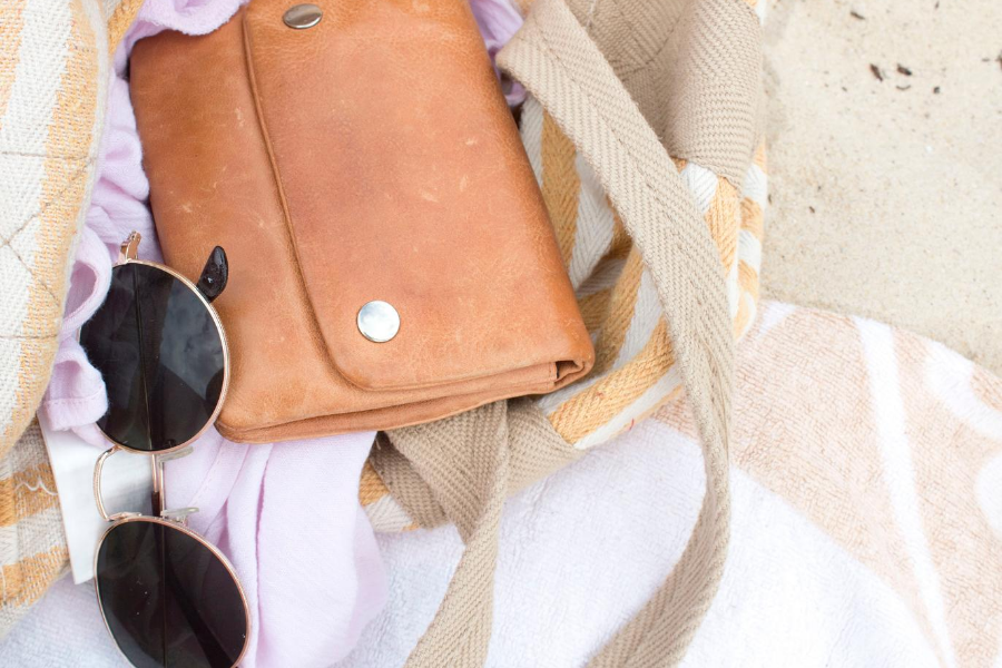 Purse and sunglasses flatlay