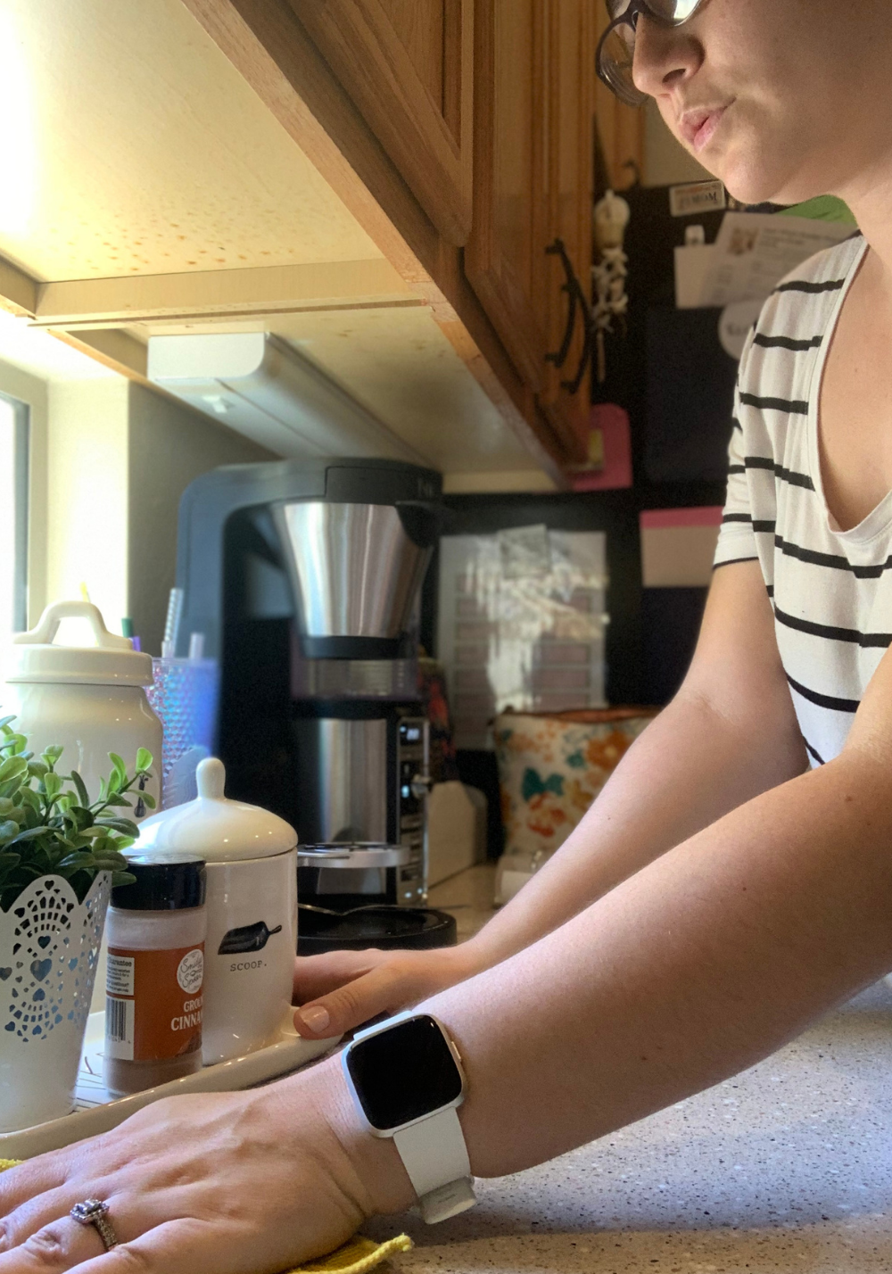 Cleaning off the counters with a rag during my simple morning cleaning routine