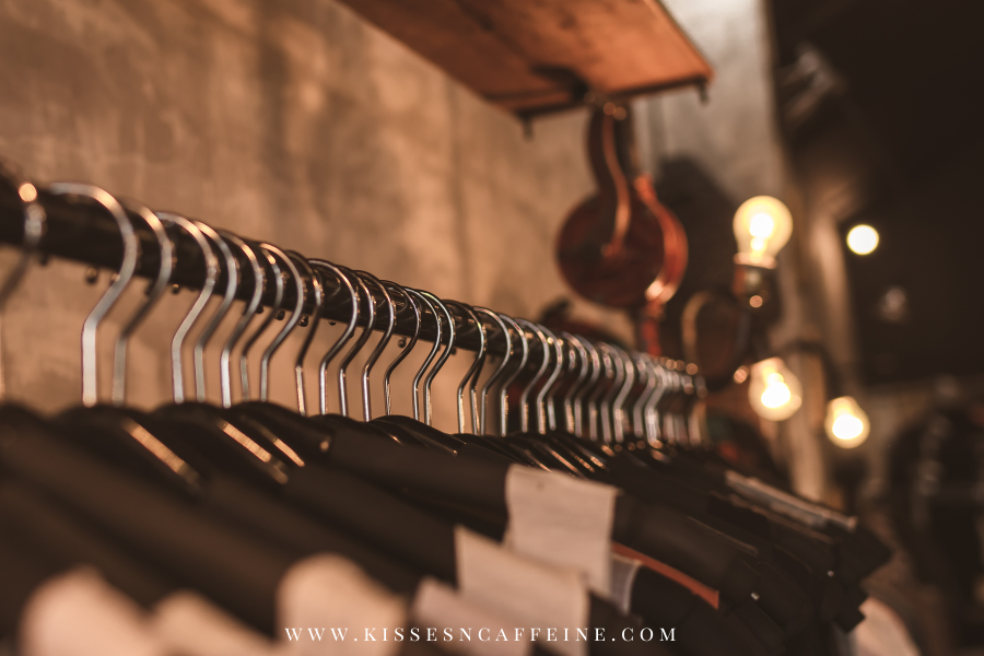 Clothing Rack filled with garments on hangers