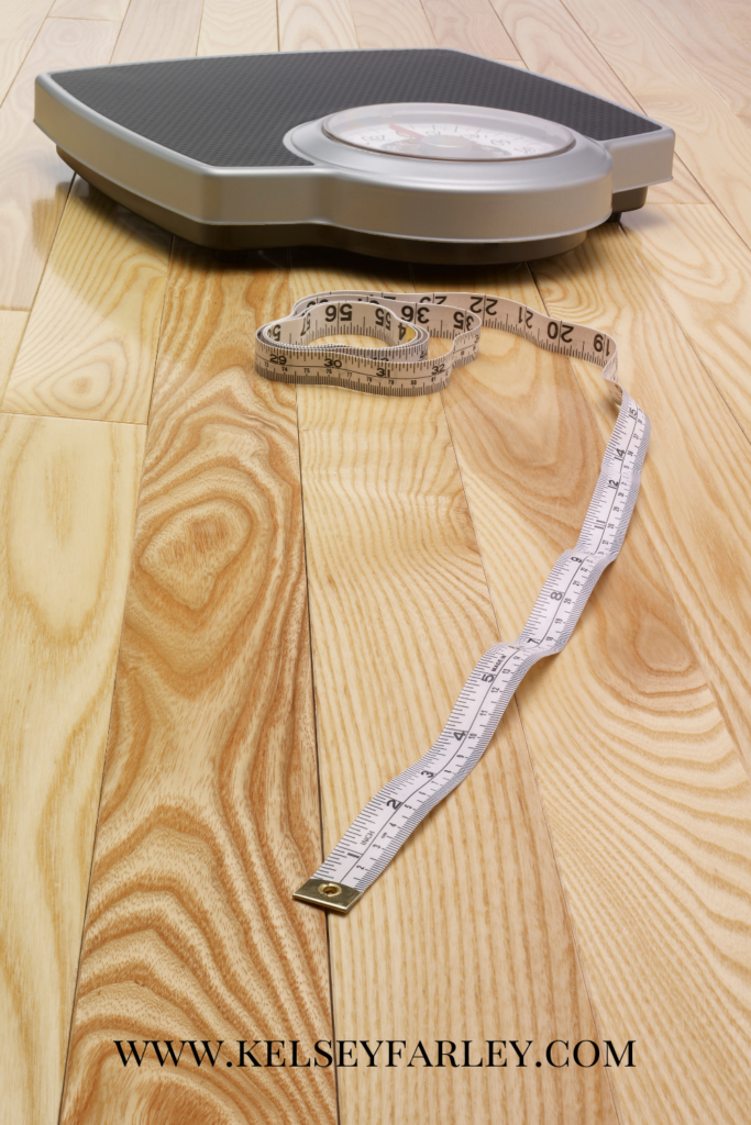 Scale with a measuring tape