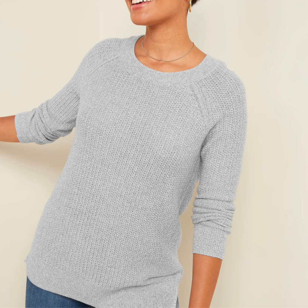 Woman wearing light blue sweater