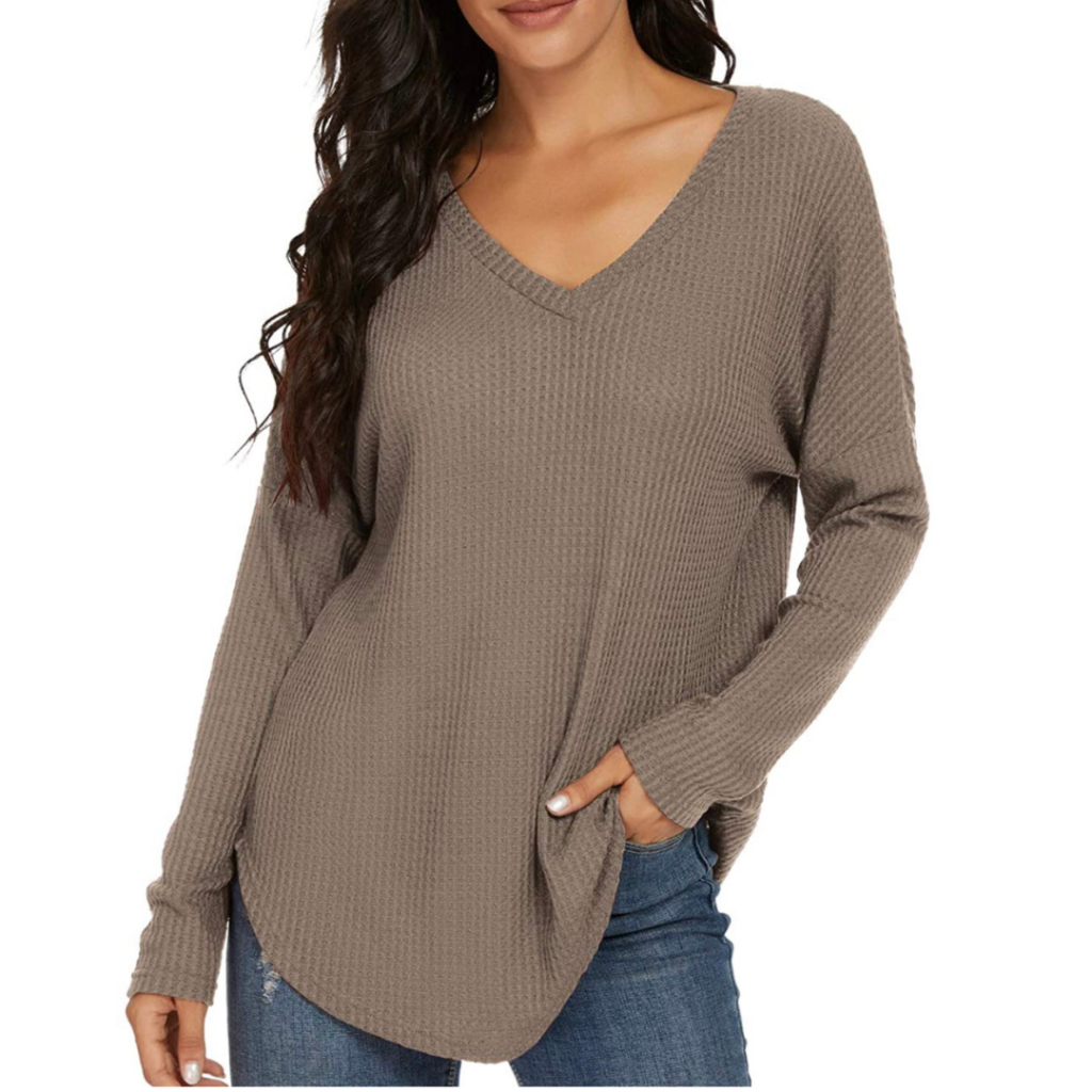 Woman wearing taupe colored sweater