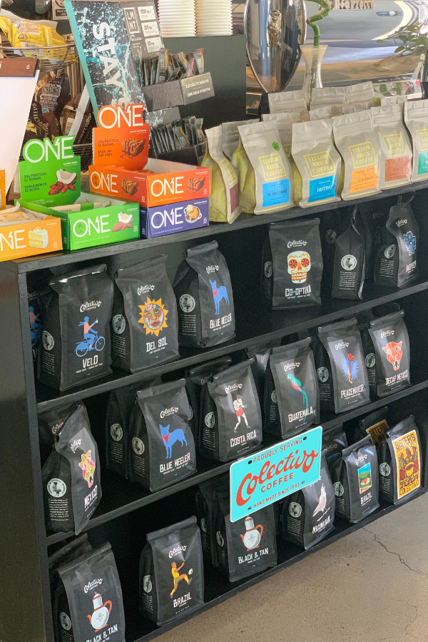 Shelf full of bags of coffee