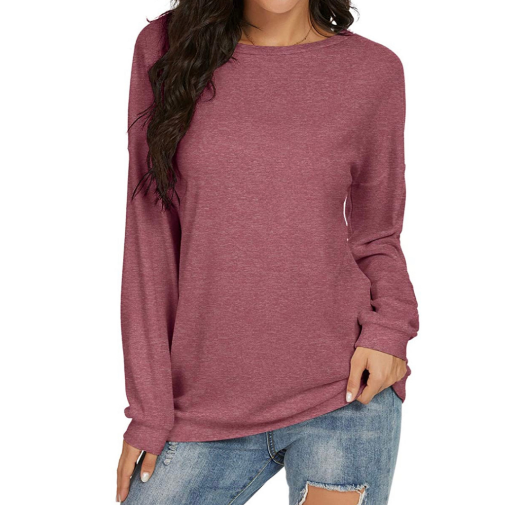 Woman wearing plum colored sweater