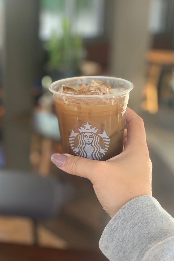 Holding a Starbucks Drink