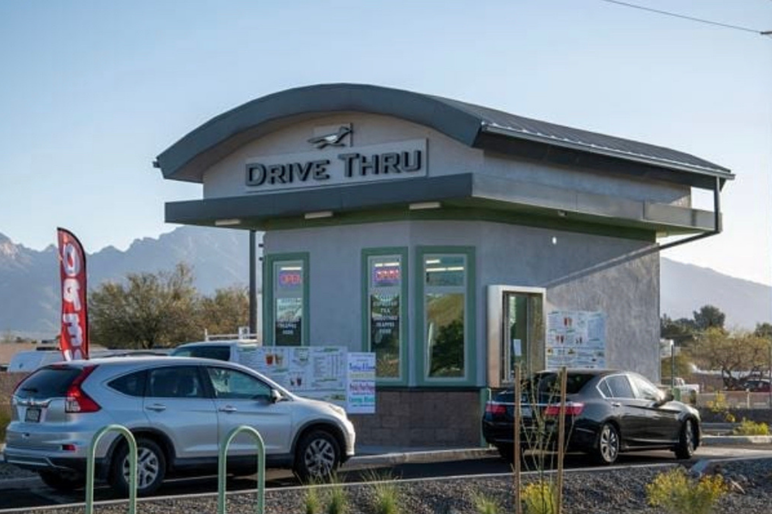 Drive-thru kiosk with cars out front