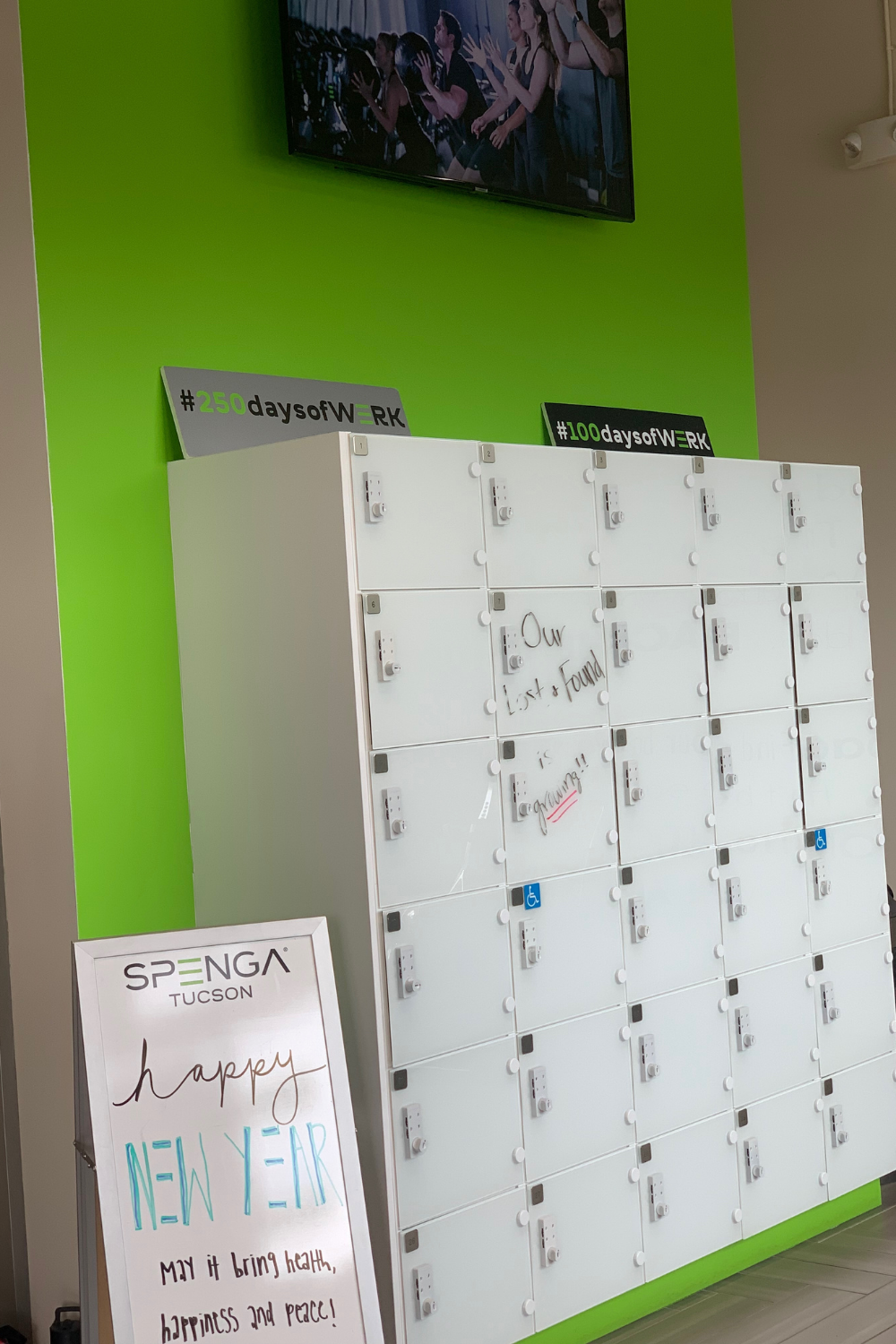 Lockers along a green wall